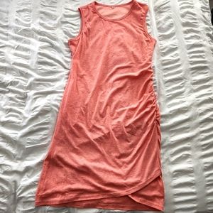 Coral sleeveles body con, tulip hem mini-dress, perfect for spring/summer